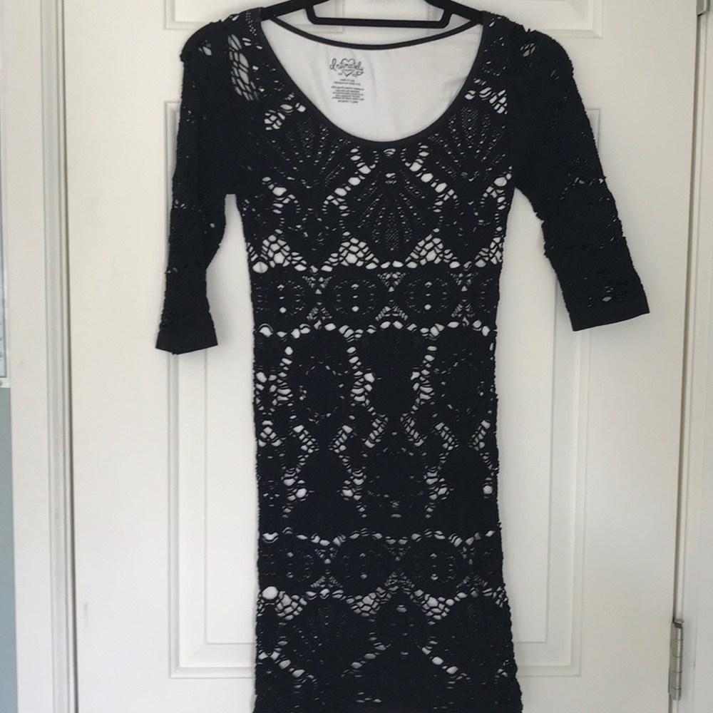 3/4 sleeve stretch knit dress with nude lining.